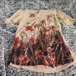 Sienna Rosa flowy sheer top with flowers.